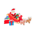 Close-up of Santa in a red sleigh with two reindeer and gift boxes from the Winter Wonderland wooden Advent Calendar set.