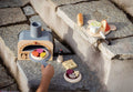 Make Me a Pizza! - Wooden Pizza Oven Toy Play Set in outdoor play scene with additional wooden food items, encouraging creative pretend cooking.