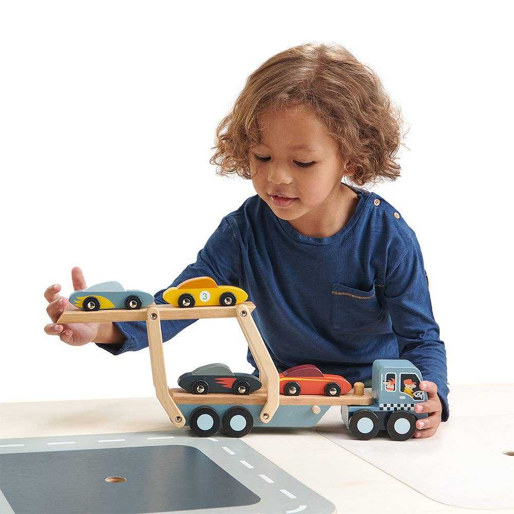Tenderleaf Toys Car Transporter - Wooden car carrier toy with 4 colorful cars and detachable ramp for imaginative play.